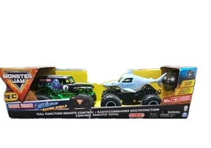 Monster Jam Official Grave Digger vs Megalodon Racing Rivals W/ 2 Wireless R/C - Picture 1 of 4