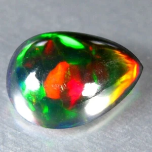 2,30 CT INCREÍBLE ÓPALO NEGRO SÓLIDO NATURAL BRILLANTE MULTICOLOR DE ETIOPÍA - Imagen 1 de 3