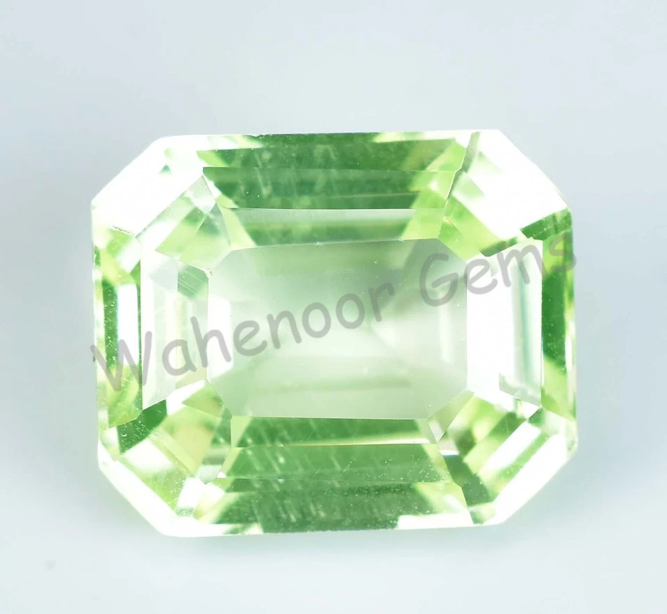 7.85 Ct Natural Green Peridot Emerald Shape VVS Pak Gemstone AGL Certified - Image 1 of 4