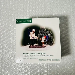 Department 56 Peanuts, Pennants and Programs 58989 Christmas in the City - Picture 1 of 7