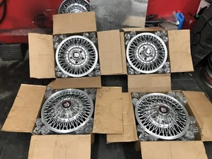 4 1985 CADILLAC TRUE SPOKE WIRE RIMS - Picture 1 of 5
