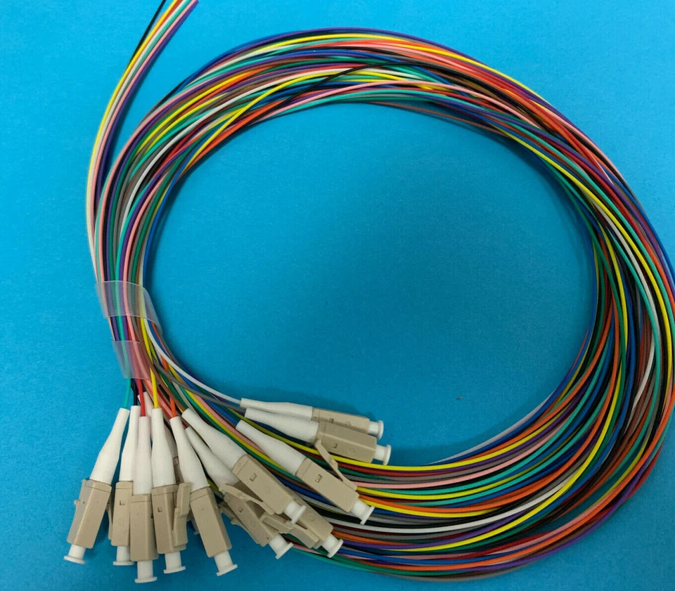 12 Optic Fiber Pigtail, Color-Coded, MMF OM2, LC/UPC, 900um, 3 Meter, Unjacketed - Image 1 of 4