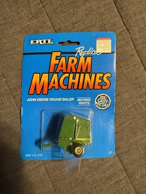 1/64th Ertl John Deere 535 Roll Baler Package Is In Great Condition! - Image 1 of 2