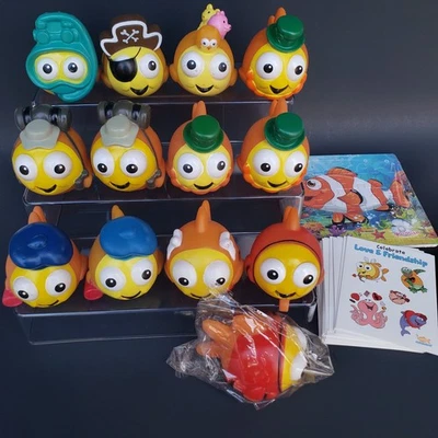 Lote de 13 juguetes escolares de natación Goldfish con rompecabezas raro y 29 hojas de pegatinas para celebrar Foto 1 de 4