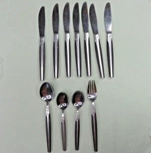 Cosmos CSM61 Lot of 12 Black Handle Atomic Starburst Knife Teaspoon Soup Salad - Picture 1 of 9