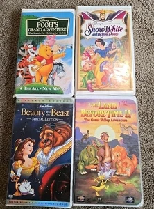 Disney LOT OF 4 VHS Pooh, Land Before Time, Snow White, Beauty & Beast - Picture 1 of 1