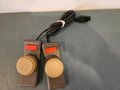 VINTAGE COMMODORE 64 PADDLE CONTROLLER SET ATARI UNTESTED - Image 1 of 2