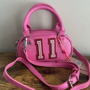 New Paris Hilton Mini Varsity Bowler Bag Crossbody PH Pink Cute 11 - Picture 1 of 5