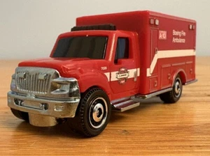 Lose Matchbox 71 /100 International Workstar Boeing Ambulance Rescue Emergency - Bild 1 von 8