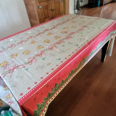 CHRISTMAS Vinyl Tablecloth Christmas Bells Poinsettia Snowflakes Pine 100" X 54" - Image 1 of 4