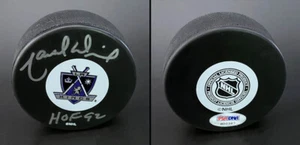 Marcel Dionne SIGNED Los Angeles Kings Logo Puck + HOF 1992 PSA/DNA AUTOGRAPHED - Picture 1 of 1