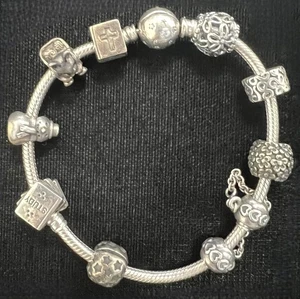 9 guaranteed genuine Pandora sterling silver charm bead bracelet - Picture 1 of 1