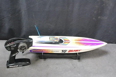 VINTAGE TRAXXAS 3810 BLAST Brushed boat NOT IN WORKING ORDER 120 - Image 1 of 4