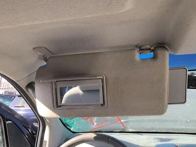 Used Left Sun Visor fits: 2006 Nissan Frontier without illumination w/extenders - Image 1 of 4
