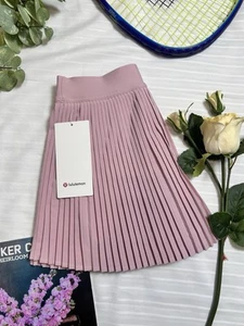 🔥Gonna da tennis plissettata Lululemon Varsity HR nuova con etichette $98 - rosa PKHZ - taglia 10 - Foto 1 di 8