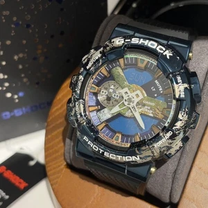 Orologio da polso Casio G-SHOCK GM-110EARTH-1AJR blu nero analogico rotondo nuovo mai usato - Foto 1 di 12