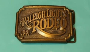 Vintage Raleigh Lights Rodeo Brass Belt Buckle - Picture 1 of 2