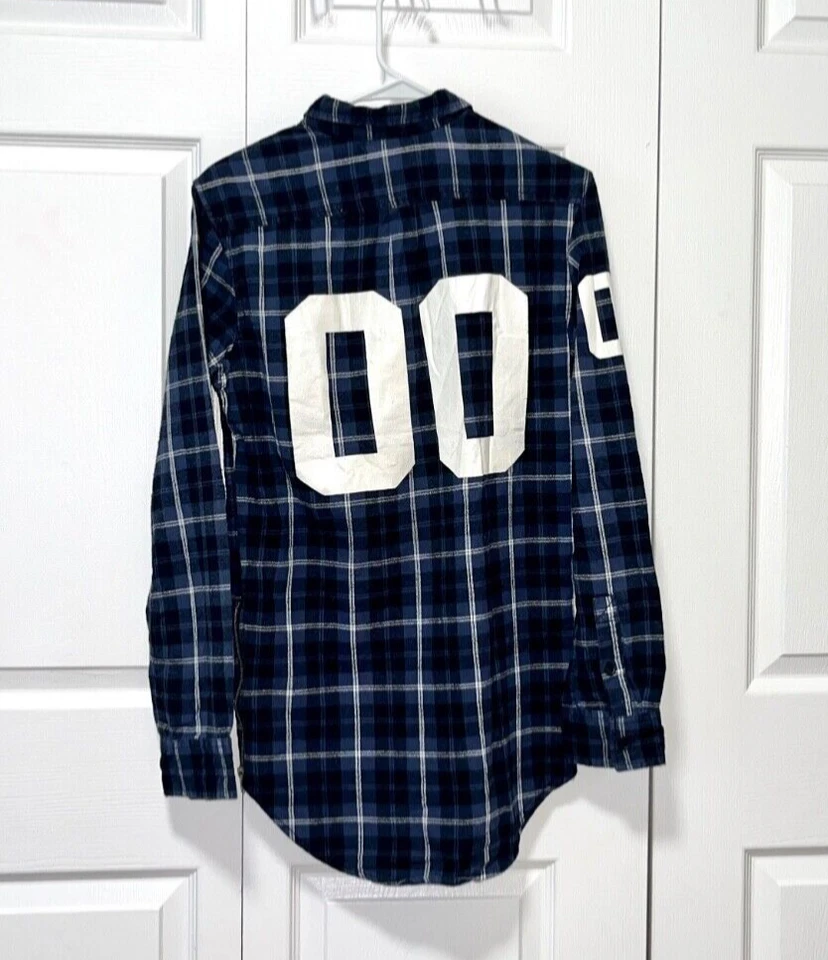 blue and black Pacsun, modern amusement flannel with numbers and zipper details - Image 1 of 4