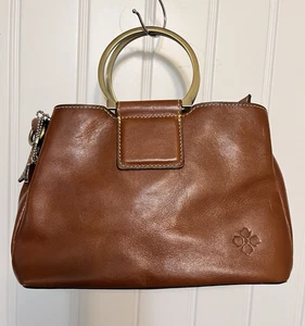 Cartera/bolso de mano Patricia Nash Empoli Heritage de cuero con asas de anillo de metal marrón - Imagen 1 de 13