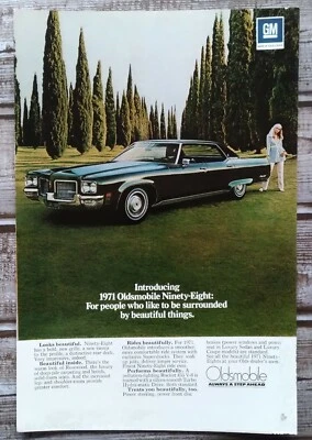 1971 Black Oldsmobile Ninety-Eight Surrounded By Trees Photo Vintage Car Ad - Image 1 of 4