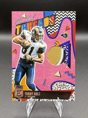 2025 Panini Donruss Elite Throwback Treads Торри Холт/Исаак Брюс #TTD-RAMS /99 - Изображение 1 из 4