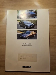 Mazda 323 C F S 1994 Brochure - Picture 1 of 3