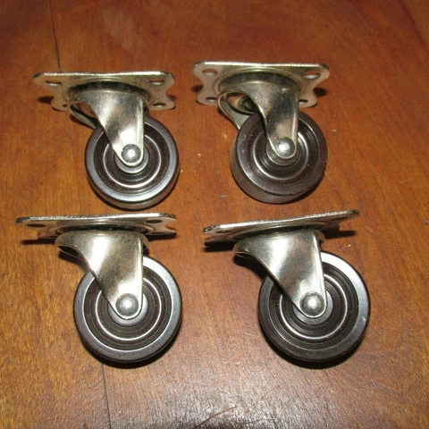 4 Matching Steel Furniture Casters 1 1/2 Inch Plastic Wheels Cover
