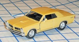 Welly Diecast 1965 Pontiac GTO Pull Back Motor Car Opening Doors Works Well VG - Picture 1 of 6