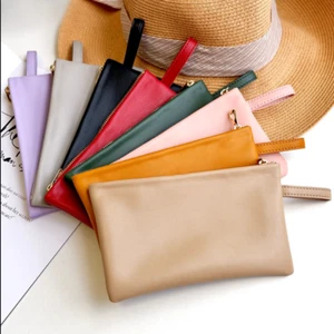 Weiche elastische Münzbeutel Geldbörse Schlüsseltasche Ohrhörertasche PU Leder - Foto 1 di 11