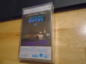 SEALED RARE OOP Miami Vice II CASSETTE TAPE tv Phil Collins DAMNED Roxy Music DD - Picture 1 of 2