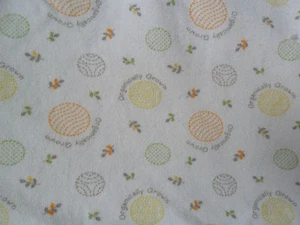 MANTA BEBÉ CULTIVADA ORGÁNICAMENTE Crema Verde Naranja Bolas Círculos 2008" - Imagen 1 de 1