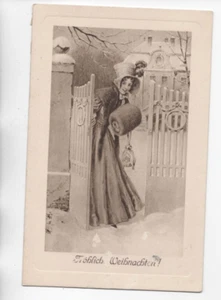 AK Wünsche zu Weihnachten/junge Frau am Gartentor Schnee ungel. - Bild 1 von 2