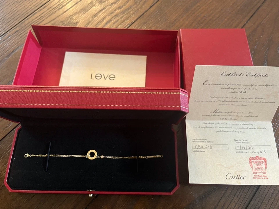 LOVE 手镯 18K 金色套装带 2 颗明亮切割钻石 总计 0.03 克拉 — 第 1/2 张图片