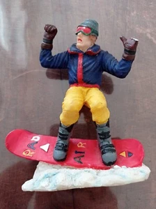 Snowboard Surfer Figur mit Aufschrift "Rad Air" - Bild 1 von 1