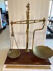 pair of antique Victorian gooseneck balance scales with brass weights, 24” high