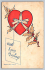 Postcard With Christmas Xmas greetings red heart bow holly