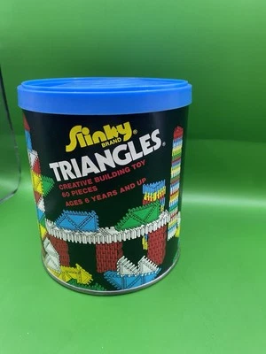 Slinky Brand Triangles In Container James Industries Vintage Toy 57 Pieces EUC - Image 1 of 4