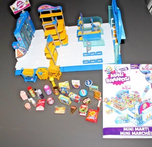 Mini Brands Mini Mart Playset con Mini Alimenti Alimentari Giocattoli in Miniatura LEGGI - Foto 1 di 7