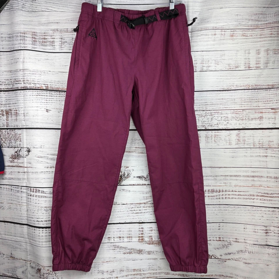 Pantalones de Senderismo Nike ACG Tejidos Trail Medianos Calientes Rosa Cinturón Ligeros Exterior Foto 1 de 4