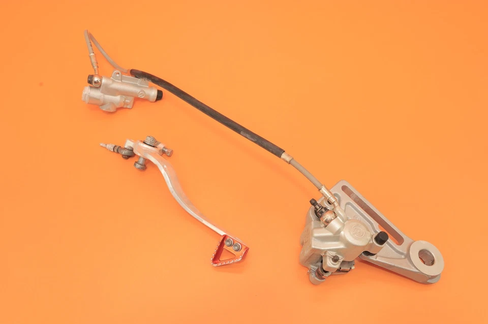 KTM 300 XC 2006 04-16 OEM pinza de freno trasera soporte cilindro maestro manguera palanca Foto 1 de 4