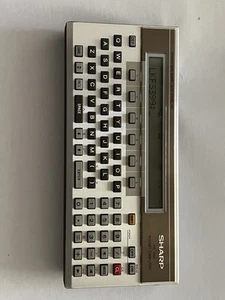 Vintage Sharp PC-1500 Pocket Computer w/ CE-159 Program Module - Picture 1 of 21