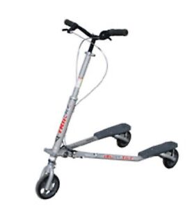New in Box TRIKKE T67s - Foldable Wheel Carving Scooter w/Instructional DVD