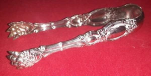 PINCE A SUCRE EN METAL ARGENTE POIDS/ 55 GR.ROCAILLE GRIFFES DE LION 14CM - Imagen 1 de 5