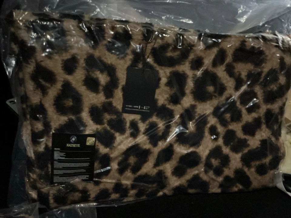 Hermosa manta caos leopardo Katseye Foto 1 de 4