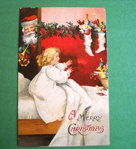 Antica cartolina natalizia Babbo Natale di Ellen Clapsaddle bambino sveglio a letto - Foto 1 di 2