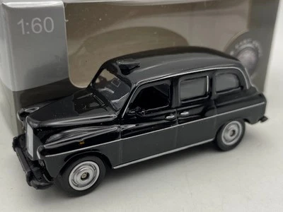 1:60 WELLY AUSTIN FX4 LONDON TAXI nero taxi diecast auto metallo - Immagine 1 di 4