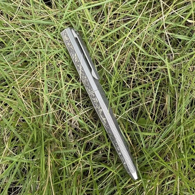 Práctico bolígrafo de bolsillo de titanio para oficina de negocios papelería bolígrafo de firma Foto 1 de 4