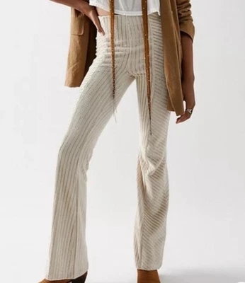 Pantalones acampanados acanalados de terciopelo Free People Penny Marfil Boho Festival Hippie L Foto 1 de 4