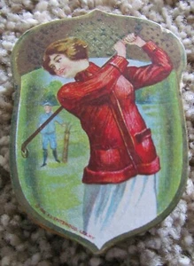 VINTAGE COLORFUL PIN CUSHION IN SHAPE OF ACORN WITH FEMAIL GOLFER-COPYRIGHT 1916 - Picture 1 of 3