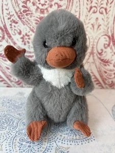 Juguete de peluche gris Niffler bebé Animales fantásticos Universal Studios 16 cm - Imagen 1 de 4
